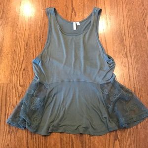 green sleeveless top